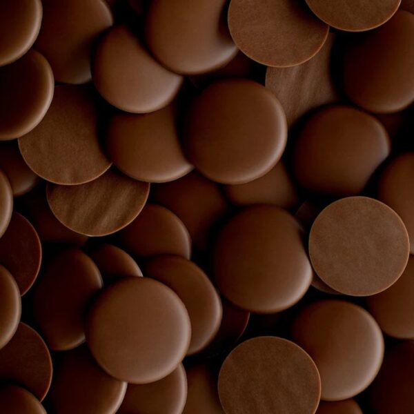 Close-up of chocolate discs overlapping each other.