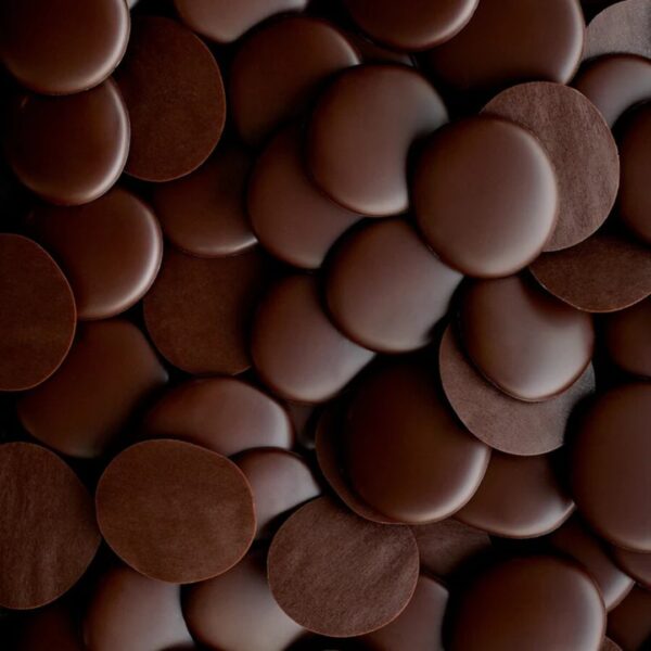 Close-up of chocolate discs overlapping.